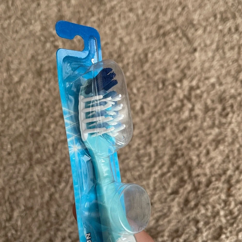 Oral B Crossaction New Blue and‎ White Toothbrush